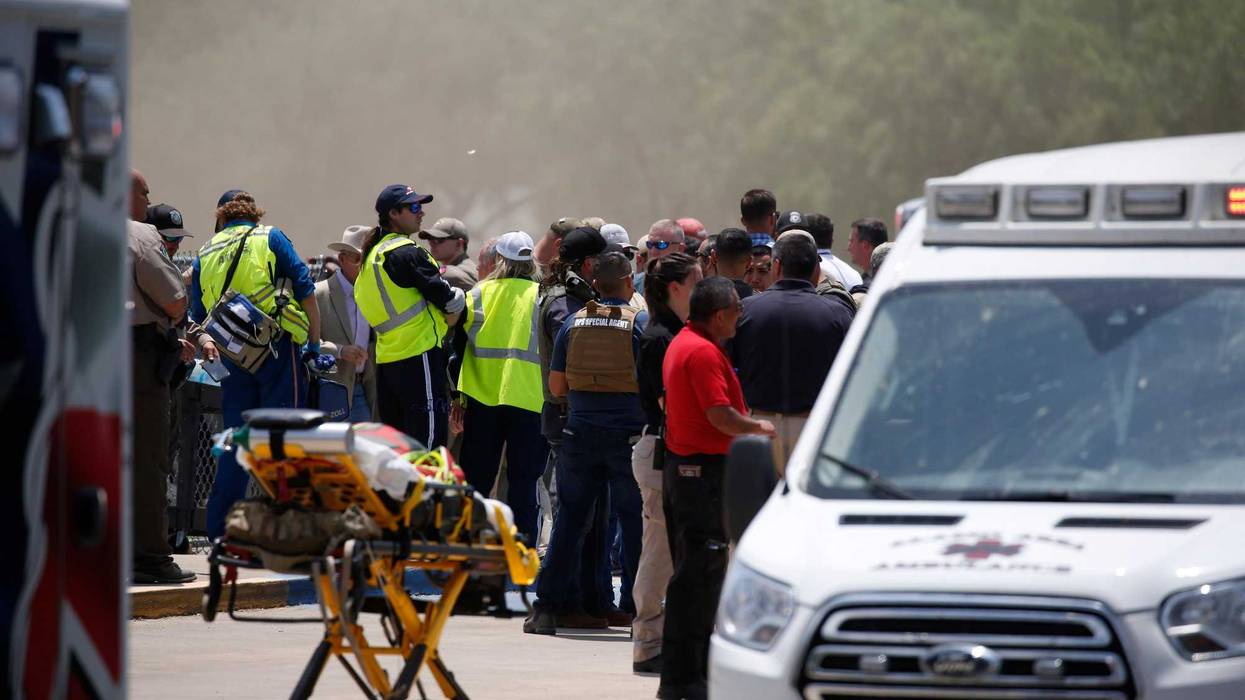 Emergency personnel gather near Robb Elementary School following a shooting, Tuesday, May 24, 2022, in Uvalde, Texas.