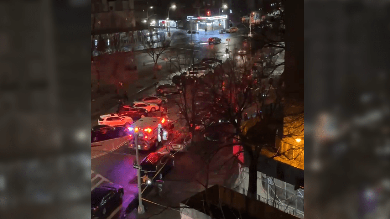 Emergency responders at the scene of Monday night's shooting in Harlem