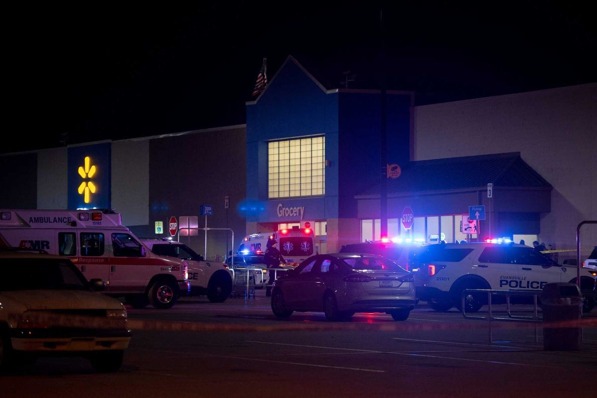 Emergency responders work the scene of a shooting at the West Side Walmart located at 335 S. Red Bank Road in Evansville, Ind., Thursday, Jan. 20, 2023.