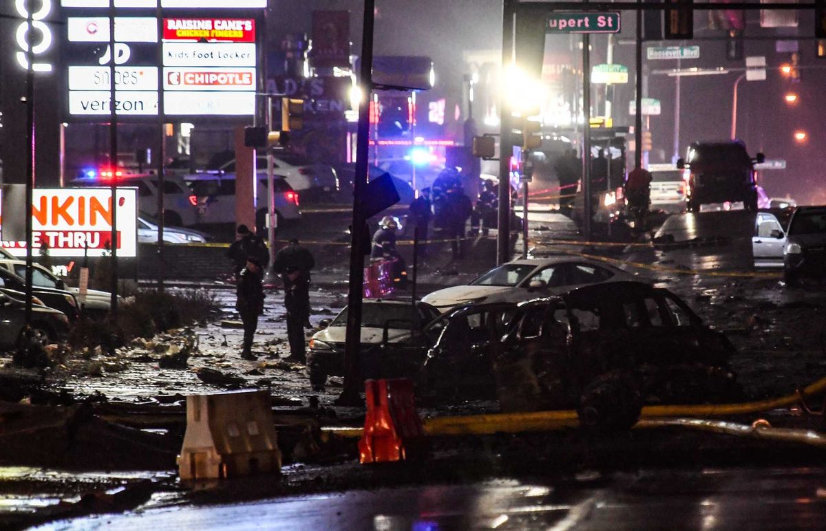 Emergency service members respond to a plane crash in a neighborhood near Cottman Avenue on Jan. 31, 2025, in Philadelphia, Pennsylvania.