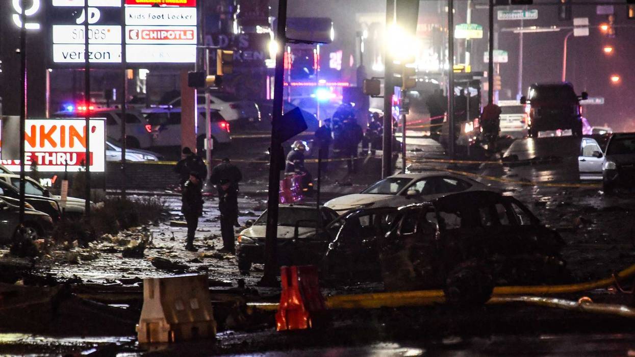 Emergency service members respond to a plane crash in a neighborhood near Cottman Avenue on Jan. 31, 2025, in Philadelphia, Pennsylvania.
