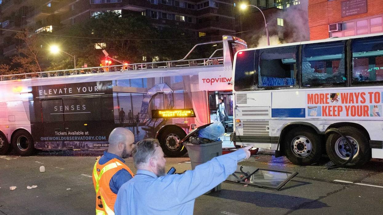 Emergency workers respond after a double-decker tour bus collided with an MTA bus at East 23rd Street and First Avenue in Manhattan on Thursday, July 6, 2023
