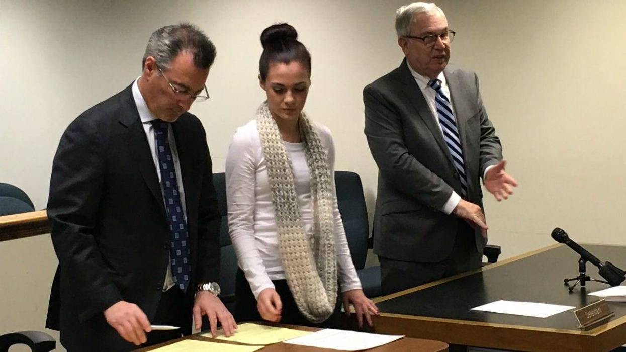 Emily Weinman is shown with her defense lawyers Stephen Sheffler and Stephen Dicht.