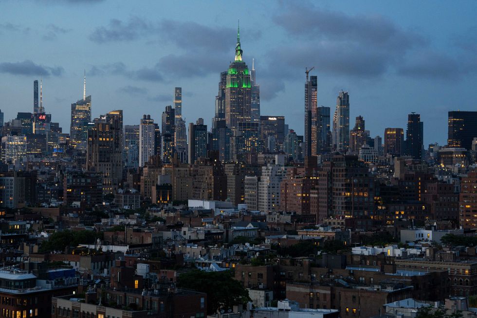 Empire State Building is lit in green with a giant inflatable green dragon to mark the new season of Max/HBO