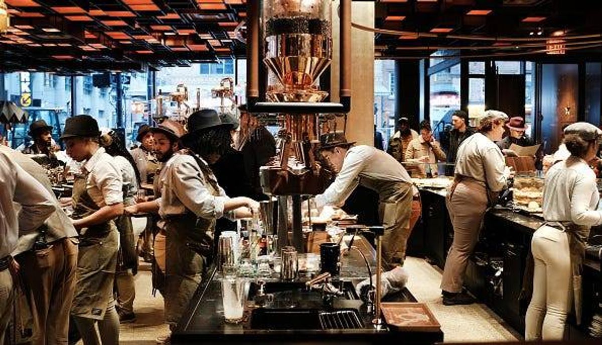 Employees serve customers at a Starbucks Reserve Roastery