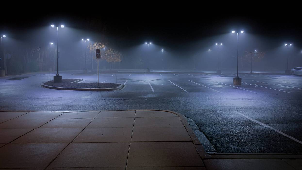 Empty parking lot at night