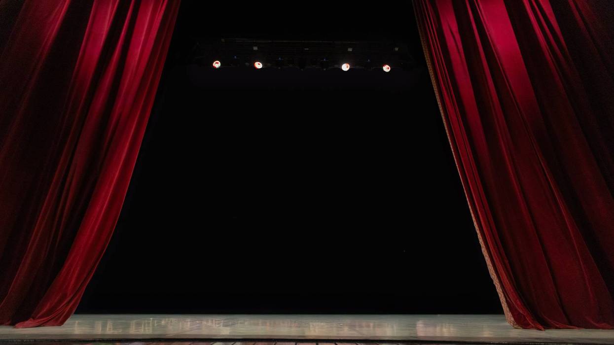 Empty Theater Stage with Open Red Velvet