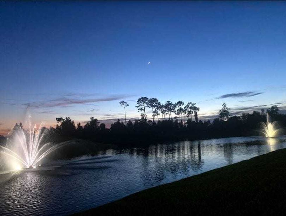 Enjoying a nightly stroll and appreciating the beautiful golf course views.