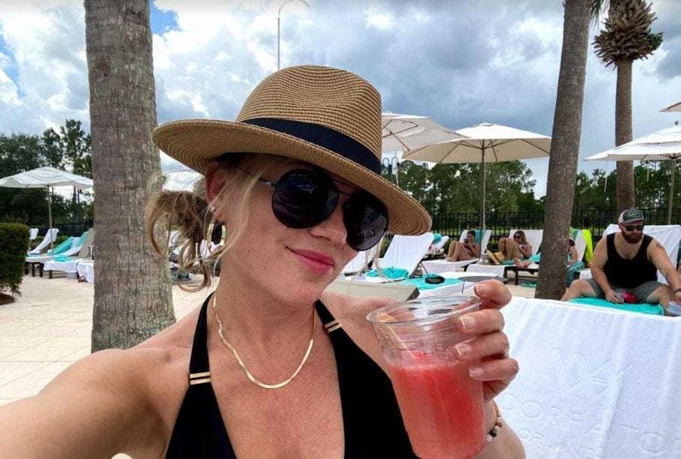 Enjoying some much needed cocktails poolside!