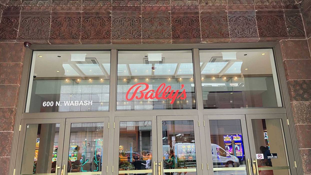 entrance to casino glass doors and Ballys logo