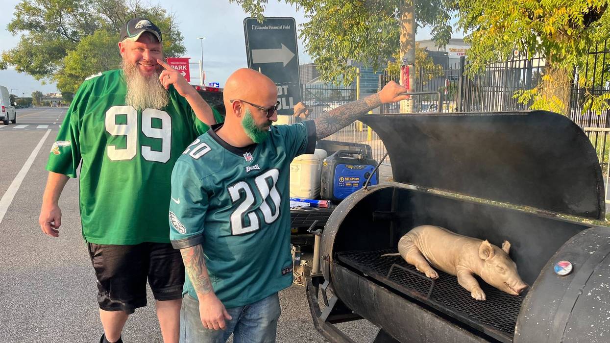 Eric Wayne is one of the early risers who started his Eagles tailgate at first light.
