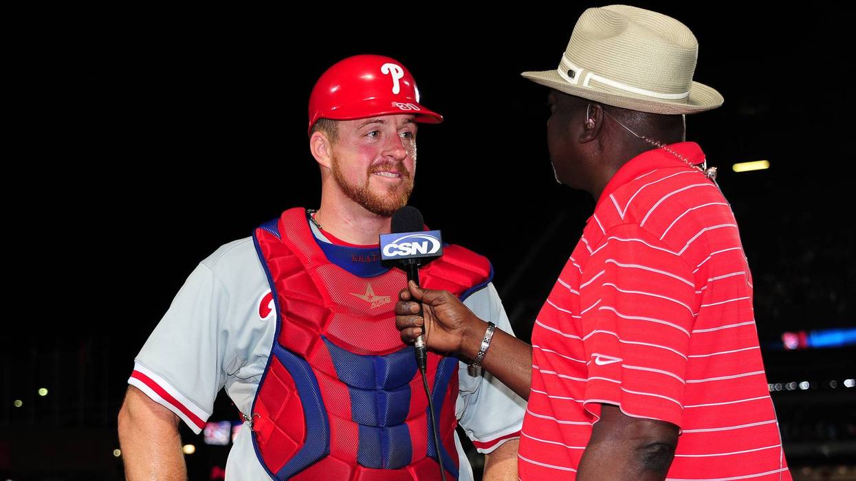 Erik Kratz of the Philadelphia Phillies is interviewed by Gary Matthews after the game against the Atlanta Braves at Turner Field on August 31, 2012 in Atlanta, Georgia.