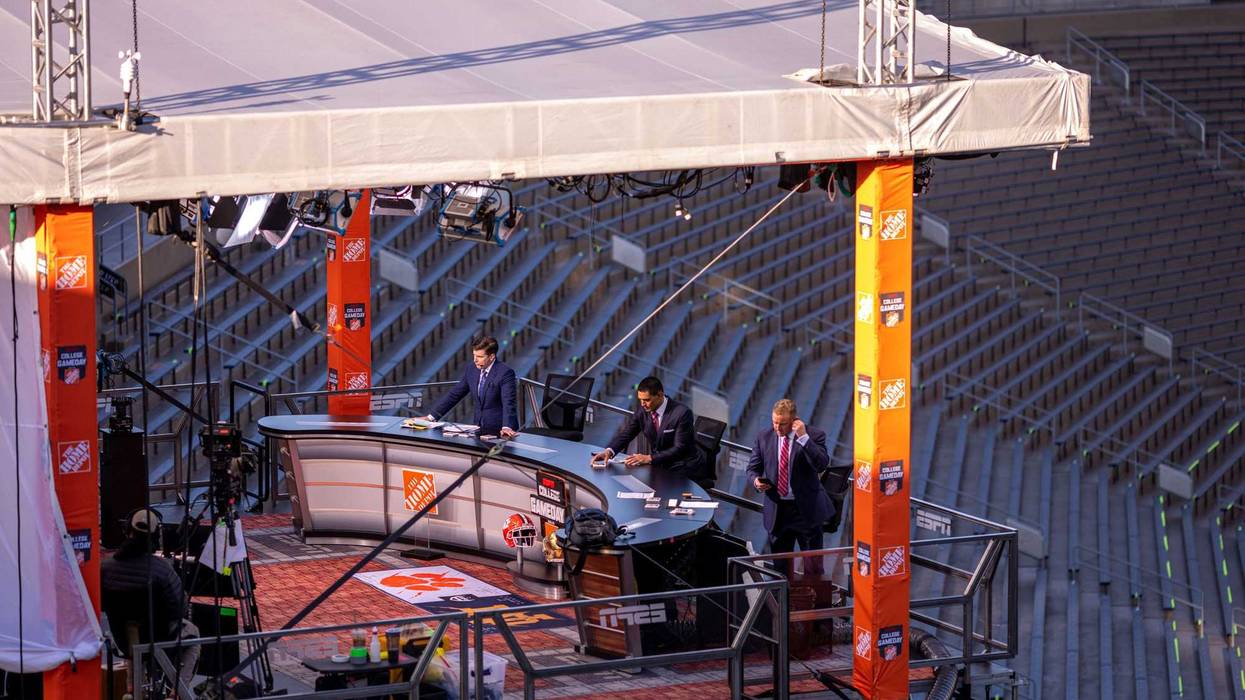 ESPN College Gameday hosts (left to right) Rece Davis, David Pollack and Kirk Herbstreit prepare for their live broadcast from Notre Dame Stadium before the game between the Notre Dame Fighting Irish