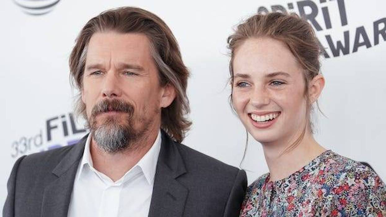 Ethan Hawke and Maya Hawke walking on the blue carpet during the 33rd Film Independent Spirit Awards on Santa Monica Beach in Santa Monica, California on March 3, 2018