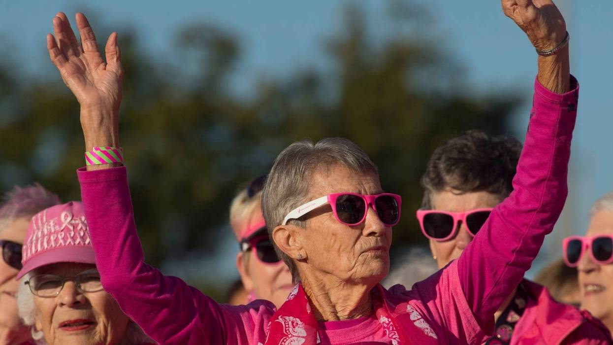 etty Singer, 87, of Evansville is acknowledged as a 47-year breast cancer survivor at the 2018 Susan G. Komen Race for the Cure at Eastland Mall Sunday morning.
