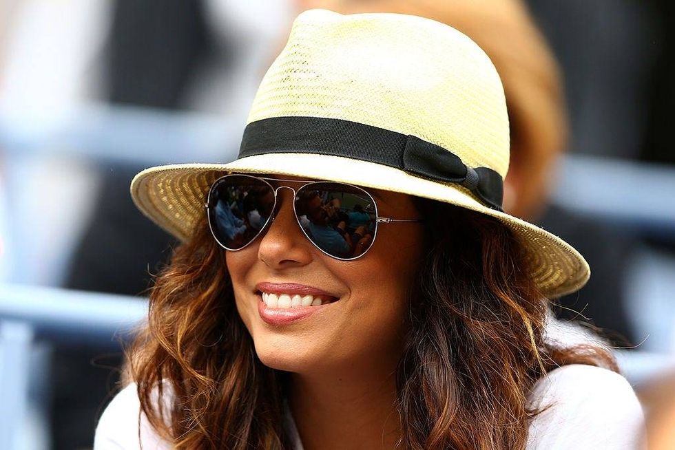 Eva Longoria wearing aviator sunglasses