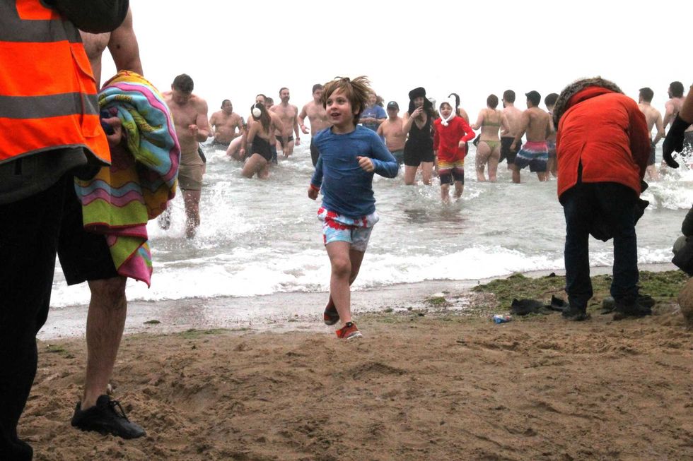 Even some kids braved the water.