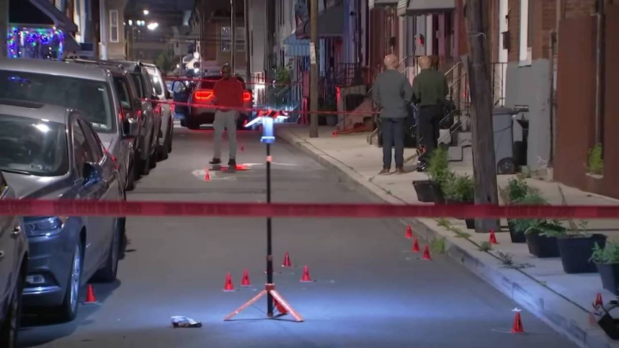 evidence markers at a shooting on Newkirk street in Brewerytown