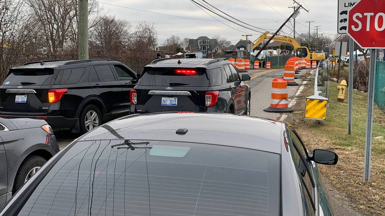 Excavator hits power pole, trapping attendees of Macomb County event on Harrison Twp. island