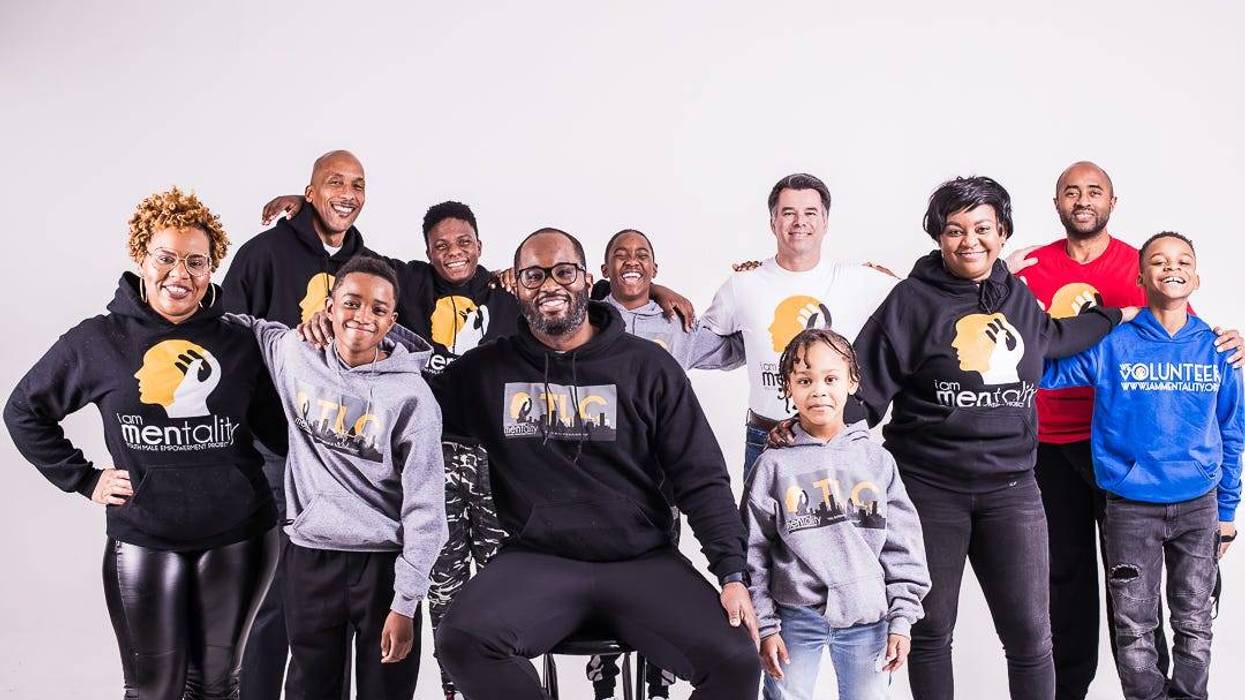 Executive Director Darren Rogers and the I AM MENtality family
