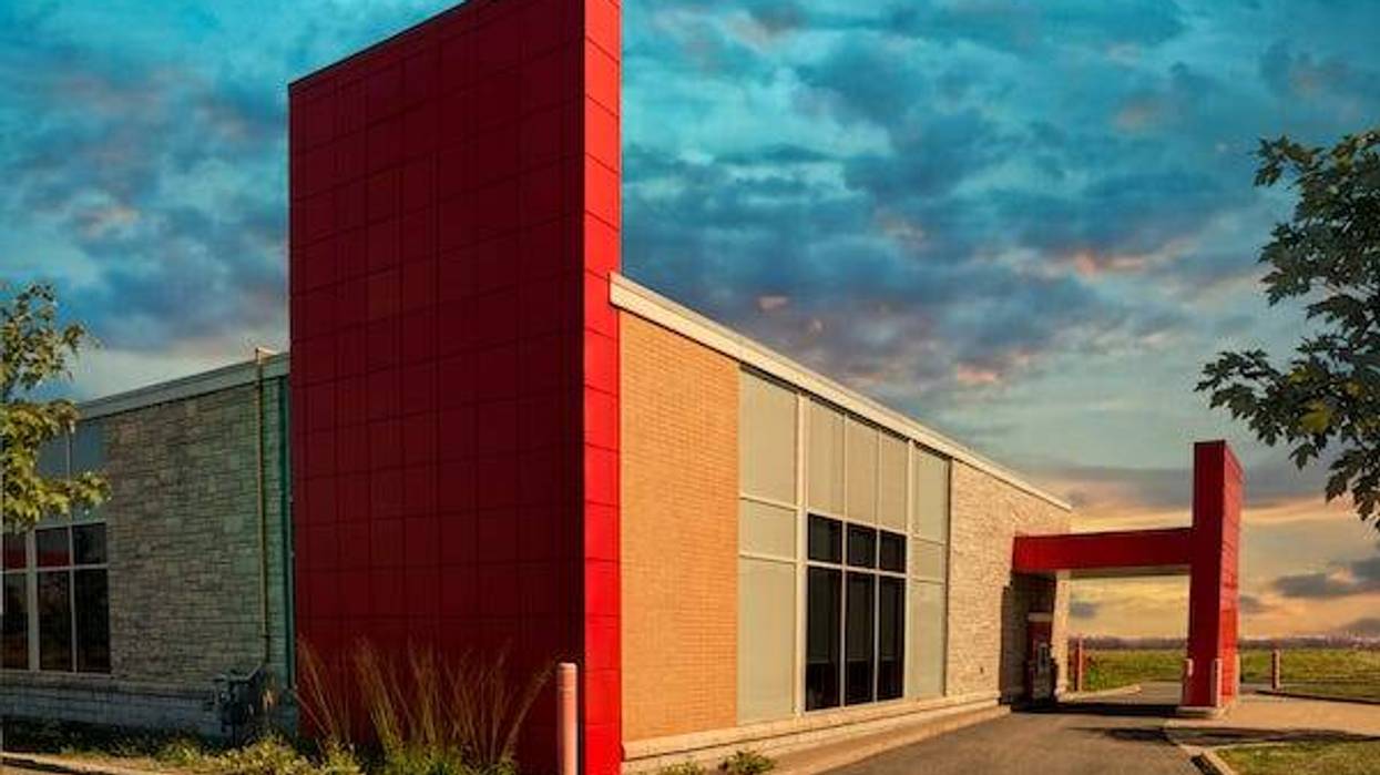 Exterior shot of a bank’s drive-thru line