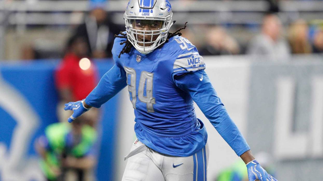 Ezekiel Ansah celebrates after a play during the second quarter against the Green Bay Packers at Ford Field.