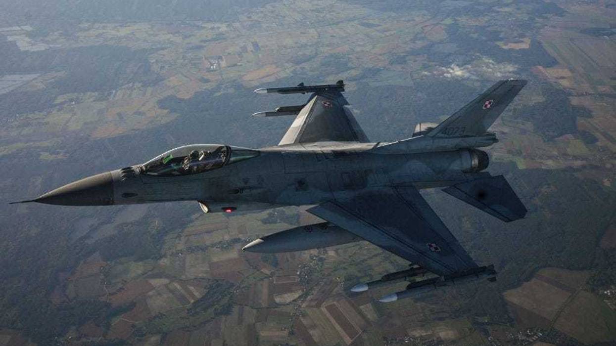 F-16 Fighting Falcon from the Polish Air Force takes part in a NATO air Shielding exercise at the Lask Air Base on October 12, 2022 in Lask, Poland. NATO's Allied Air Command, the Polish Air Force and the United States Air Force demonstrate the modern aircraft capabilities of Polish F-16s and the U.S. F-22s. As the Russian Invasion of Ukraine continues, NATO member Poland has been investing in new military equipment and various NATO allies' troops are now stationed in the country. (Photo by Omar Marques/Getty Images)