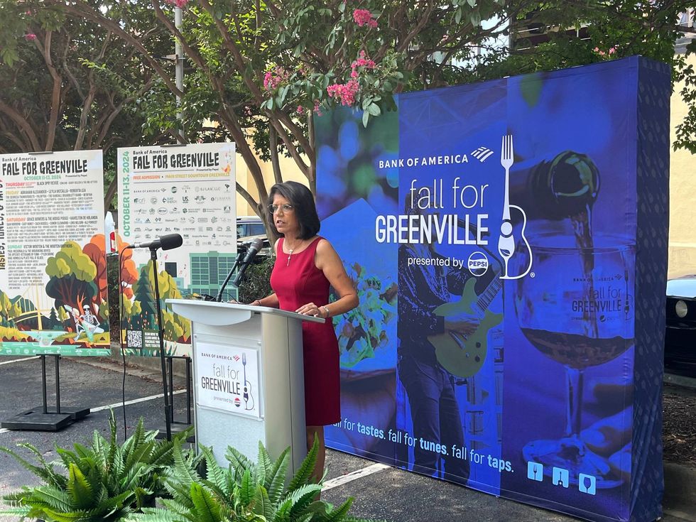Fall for Greenville Board Chair Veera Gaul speaking at a preview press conference for Fall for Greenville