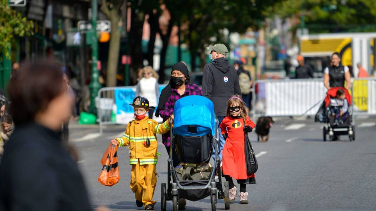 Families and children trick-or-treat on the Upper West Side on Oct. 31, 2021