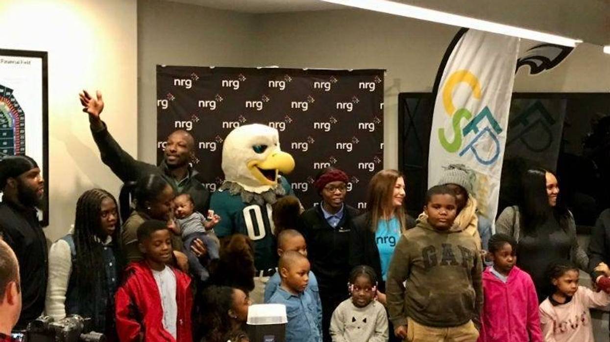 Families find out they win a scholarship at Lincoln Financial Field.