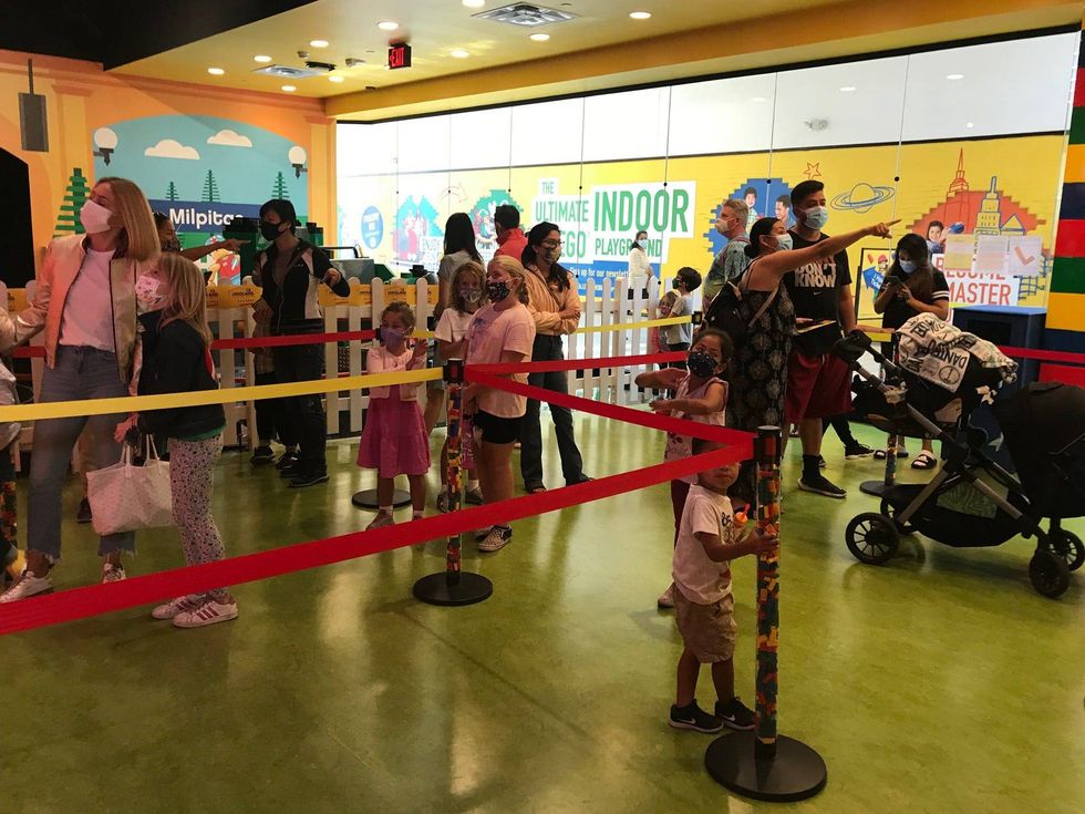 Families line up for the opening of the LEGOLAND® Discovery Center Bay Area. June 14, 2021.