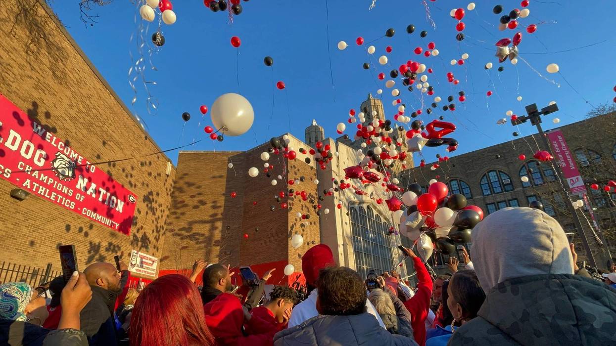 Family and friends gathered outside Simon Gratz High School on March 30, 2023, to mourn the loss of 15-year-old Devin Weedon, who was shot and killed while walking to school days earlier.