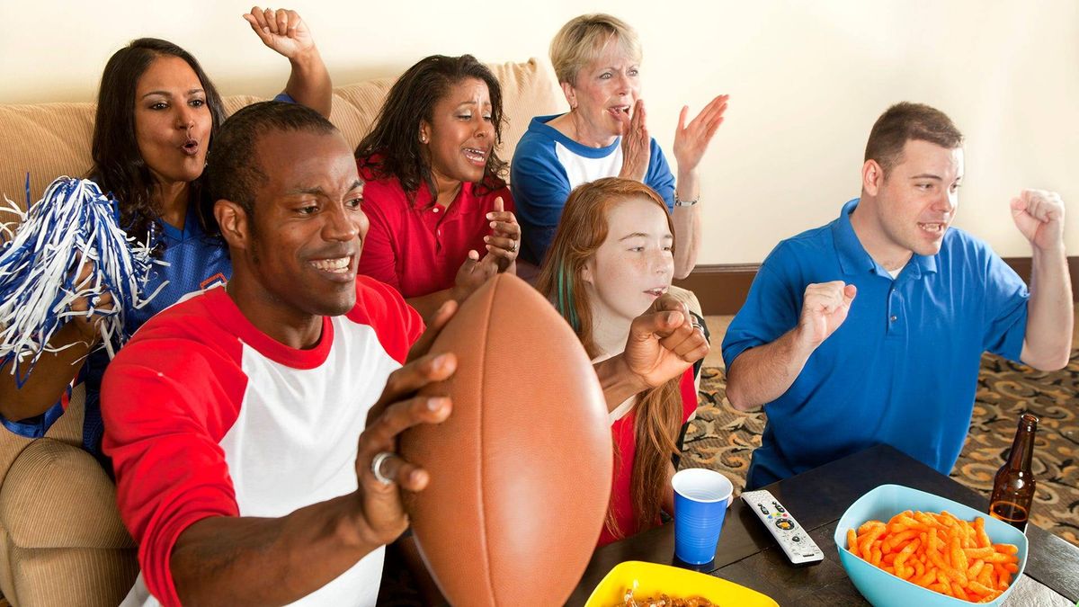 Family and Friends Watching a Football Game