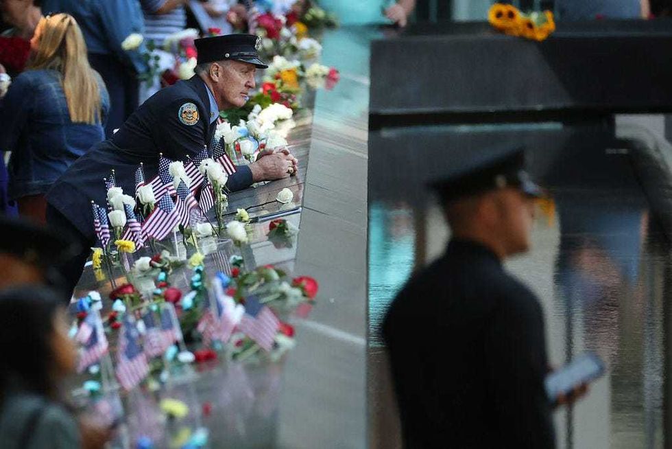 Family, friends and colleagues of those killed in the 9/11 and the 1993 bombing terror attacks participate in the annual commemoration ceremony at the National 9/11 Memorial and Museum on September 11, 2021 in New York City.