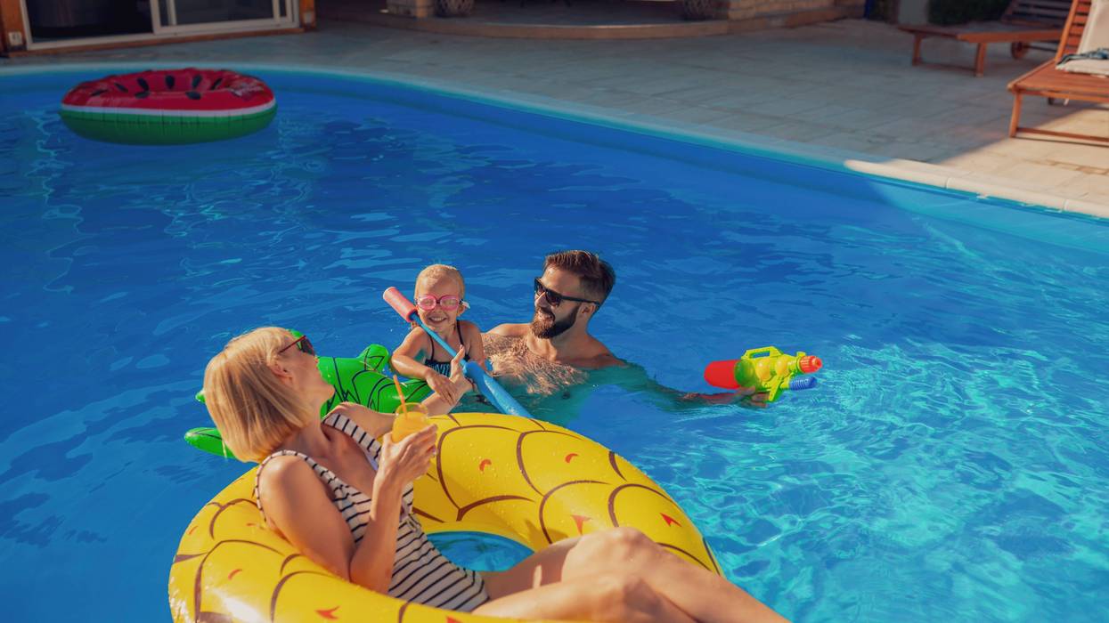 family in pool