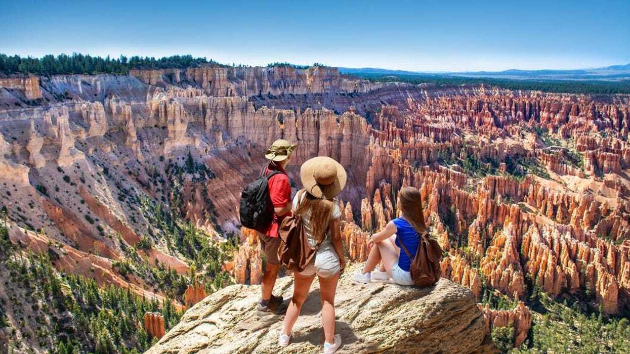 Family looking at the beautiful view of Inspiration Point, Bryce Canyon National Park, Utah, USA