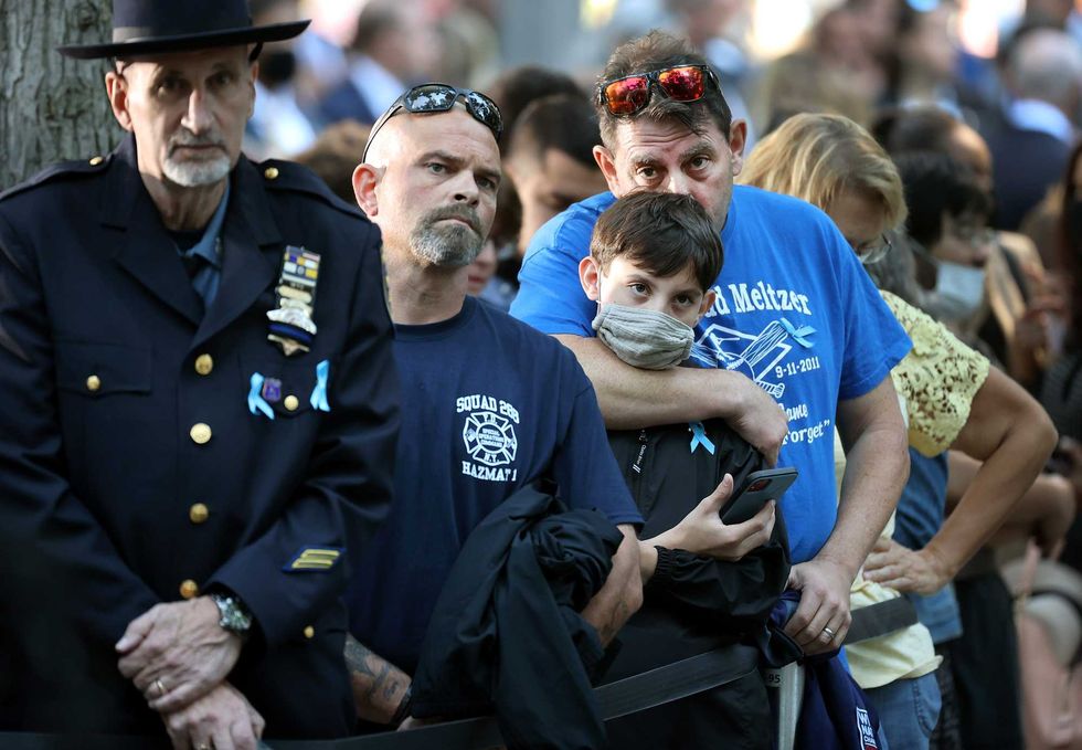 Family members and loved ones of Stuart Todd Meltzer attend the annual 9/11 Commemoration Ceremony at the National 9/11 Memorial and Museum on September 11, 2021 in New York City