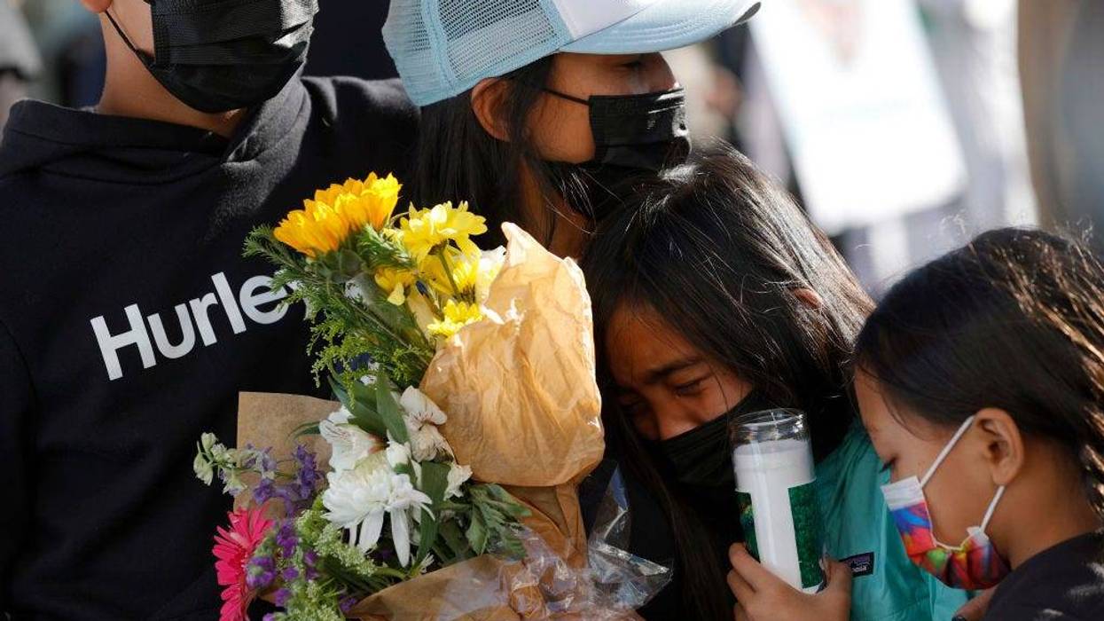 Family members of Santa Clara Valley Transportation Authority (VTA) light rail yard shooting victim Paul Megia react during a vigil at San Jose City Hall on May 27, 2021 in San Jose, California.