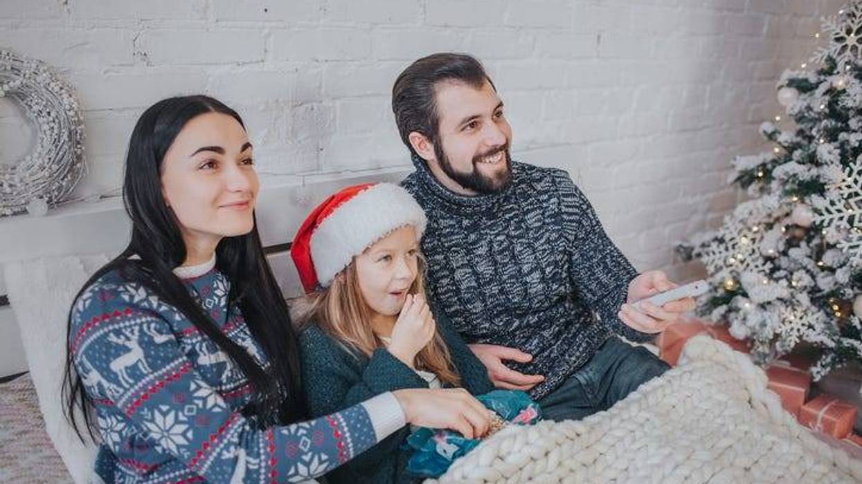 Family watching Christmas movies
