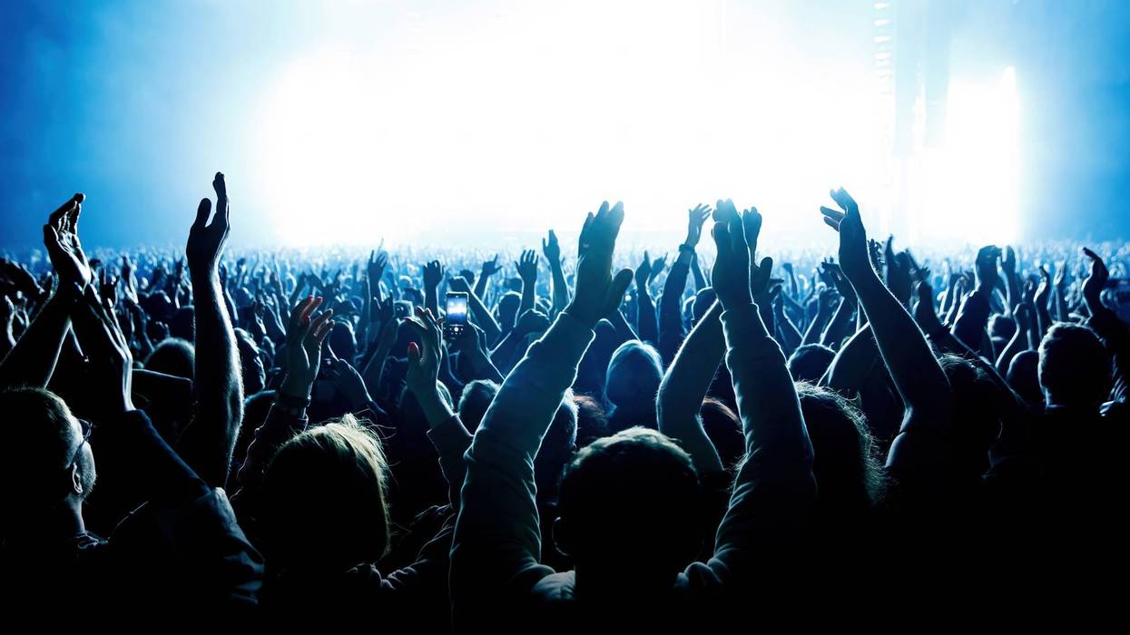 Fans attend a concert