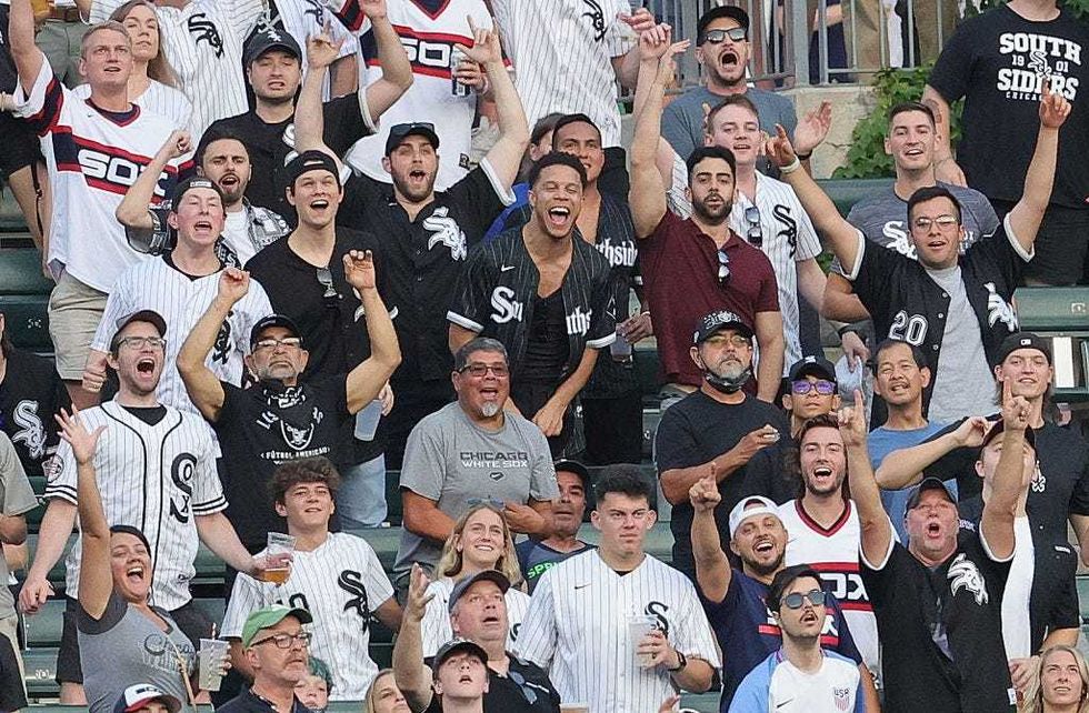 Fans cheer after Jose Abreu of the Chicago White Sox hit a solo home run in the 1st inning against the Kansas City Royals at Guaranteed Rate Field on August 05, 2021 in Chicago, Illinois.