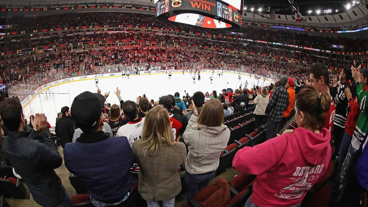 Fans cheer after the Chicago Blackhawks beat the San Jose Sharks at the United Center on March 11, 2020 in Chicago, Illinois.