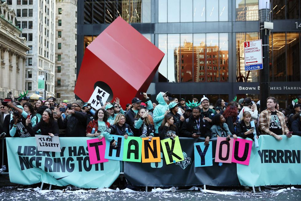 Fans cheer during the New York Liberty Ticker Tape Victory Parade & Rally on October 24, 2024