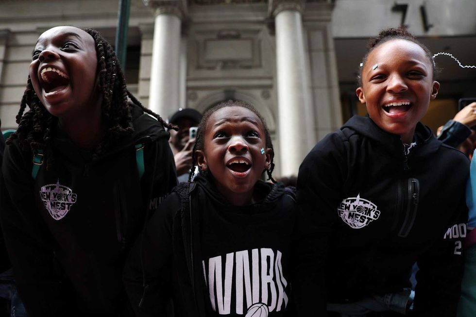 Fans cheer during the New York Liberty Ticker Tape Victory Parade & Rally on October 24, 2024