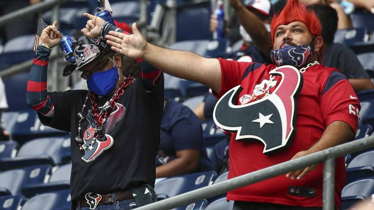 Fans cheer in the stands during the game between the Houston Texans and the Jacksonville Jaguars at NRG Stadium.