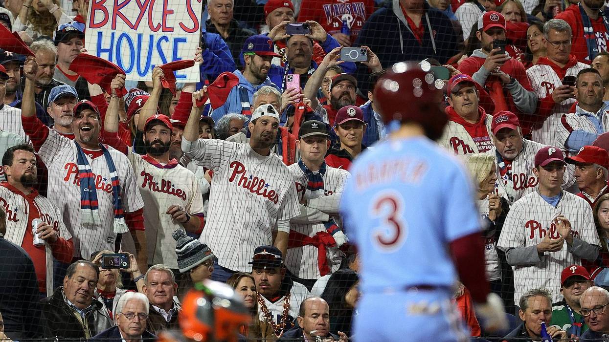 Fans look on as Bryce Harper of the Philadelphia Phillies is at bat against the Houston Astros during the first inning in Game 5 of the 2022 World Series at Citizens Bank Park on November 0, 2022 in Philadelphia, Pennsylvania.