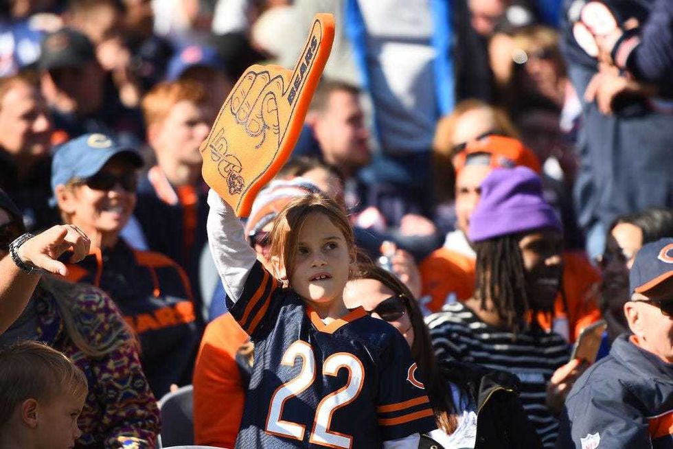 Fans of the Chicago Bears cheer during a game against the Los Angeles Chargers at Soldier Field on October 27, 2019 in Chicago, Illinois.