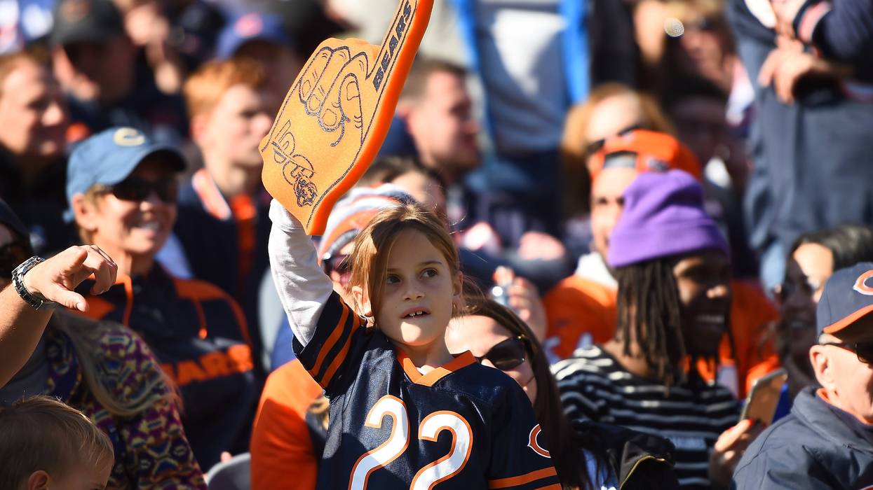 Fans of the Chicago Bears cheer during a game against the Los Angeles Chargers at Soldier Field on October 27, 2019 in Chicago, Illinois.