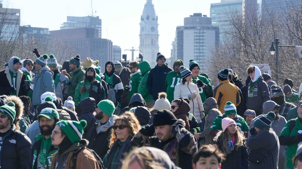 Fans wait for the Philadelphia Eagles Super Bowl parade to reach the Philadelphia Museum of Art area, Friday, Feb. 14, 2025.