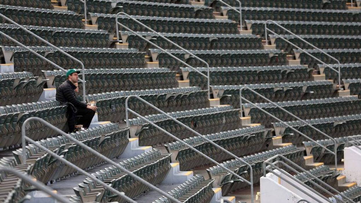 Fans watch the Oakland Athletics play the Texas Rangers at RingCentral Coliseum on May 26, 2022 in Oakland, California.